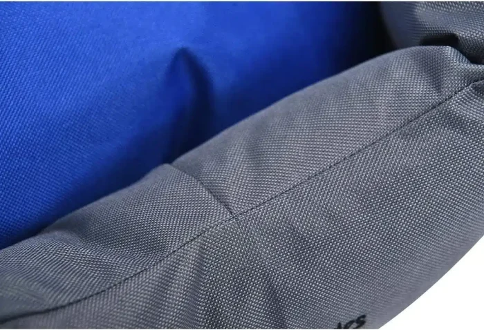 Amazon Basics Water-Resistant Pet Bed for Small Dogs - Oval, Royal Blue, 22.8-Inch - Image 8